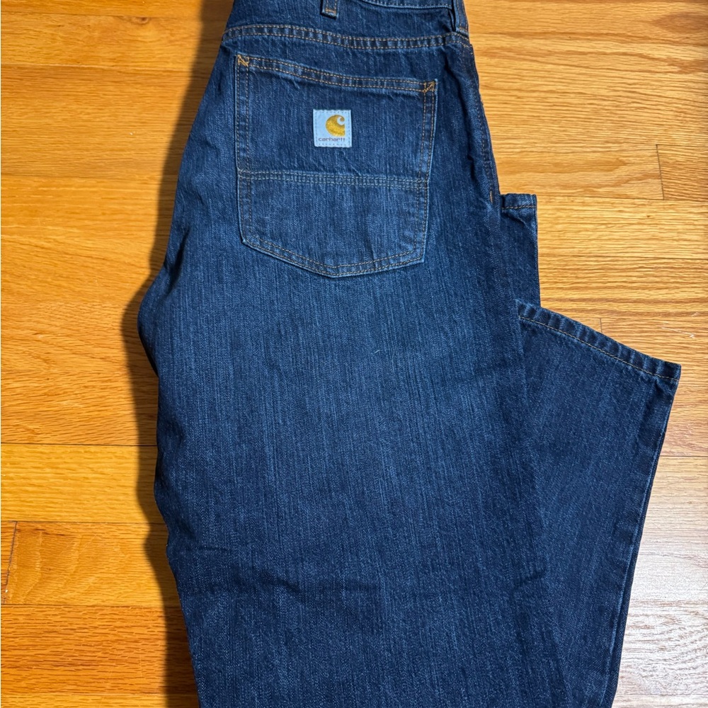 NWT- Carhartt Men's Relaxed Fit 5-Pocket jeans. Size 34/30